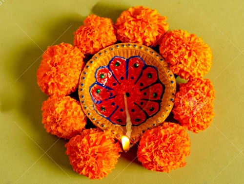 Diwali lamp and flower rangoli