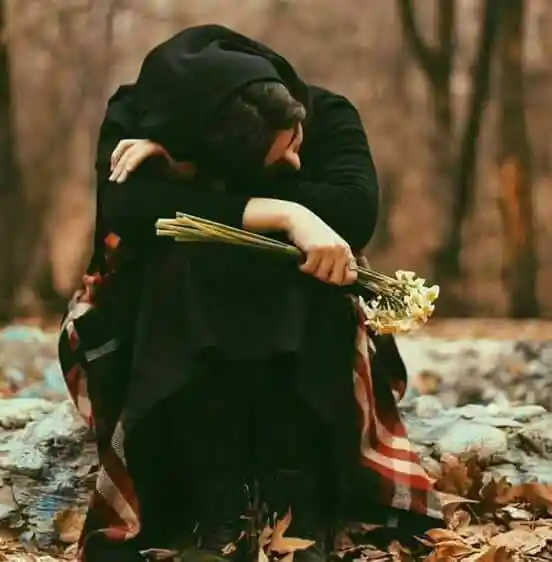 sad girl with flowers