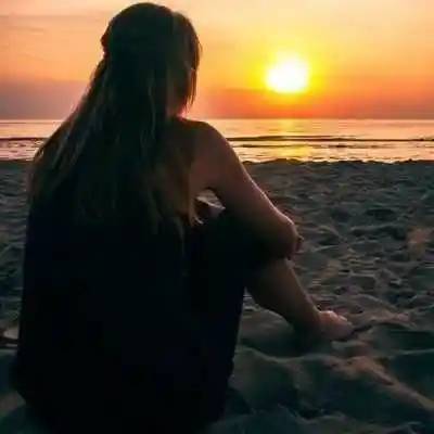 alone girl on sea beach